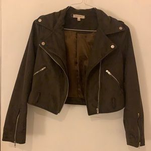 Retro suede jacket in dark brown. Satin inner lining. Lots of zippers.